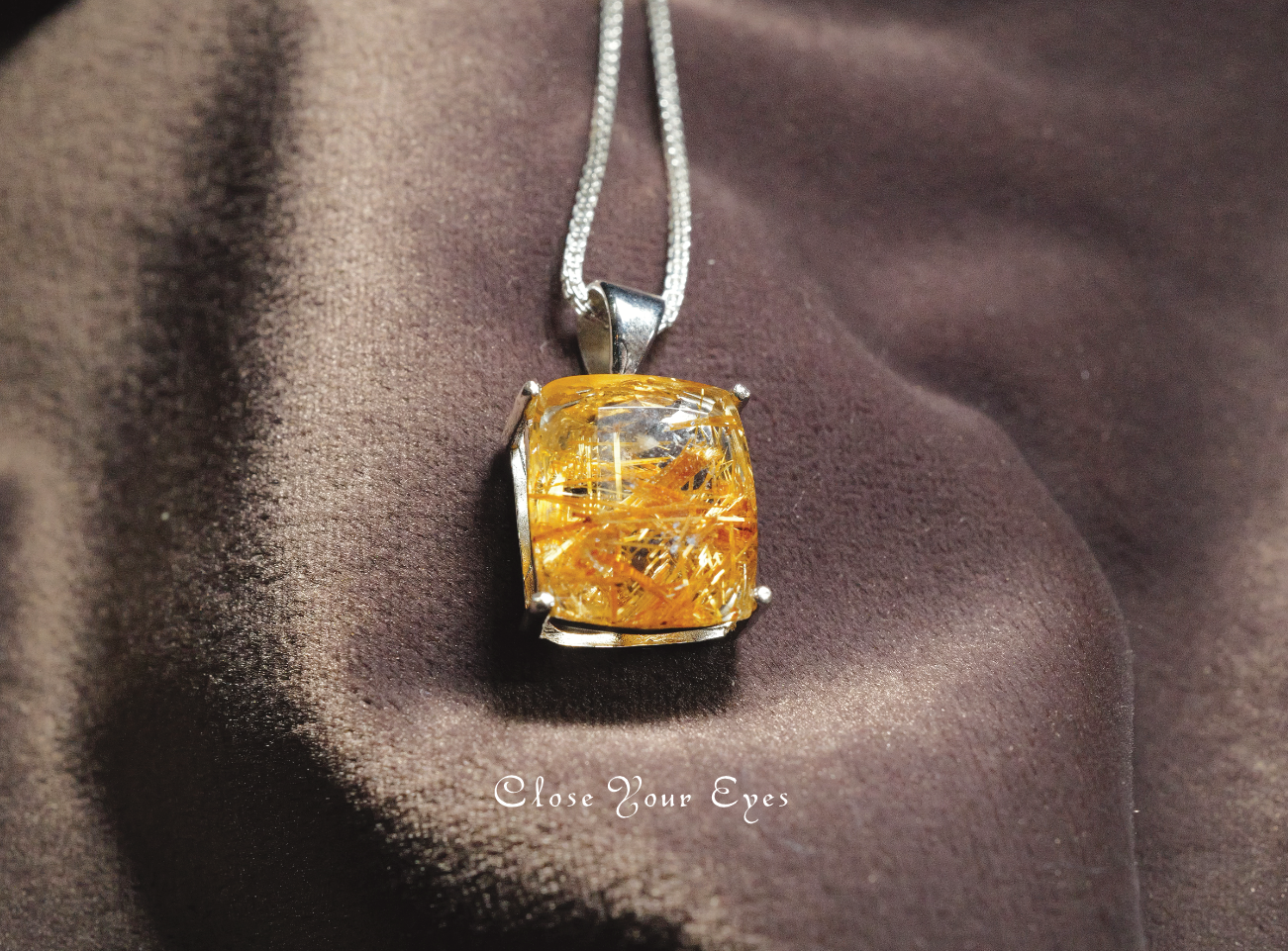 金のルチルクォーツ　１２５　シルバーペンダント