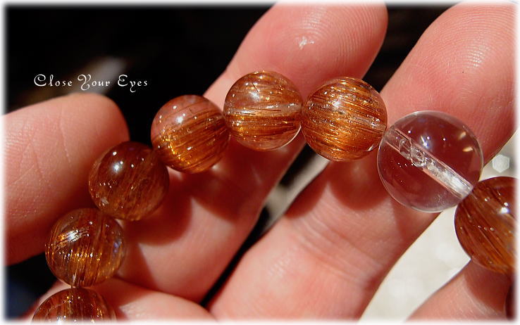 レアな石達　キャッツアイオレンジルチルクォーツ　11ミリ　画像１